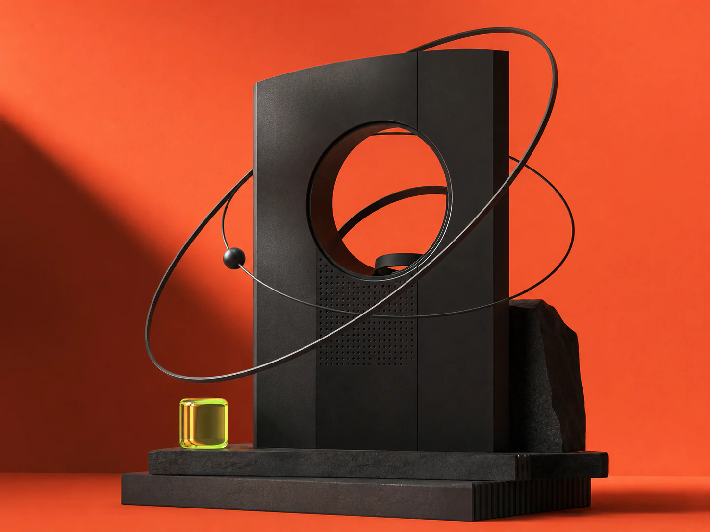 Abstract black command-center sculpture with orbital rings on a coral set